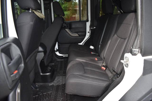 used 2014 Jeep Wrangler Unlimited car, priced at $19,990