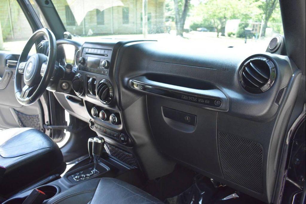 used 2014 Jeep Wrangler Unlimited car, priced at $16,990