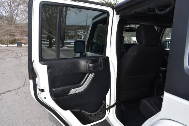 used 2014 Jeep Wrangler Unlimited car, priced at $17,490