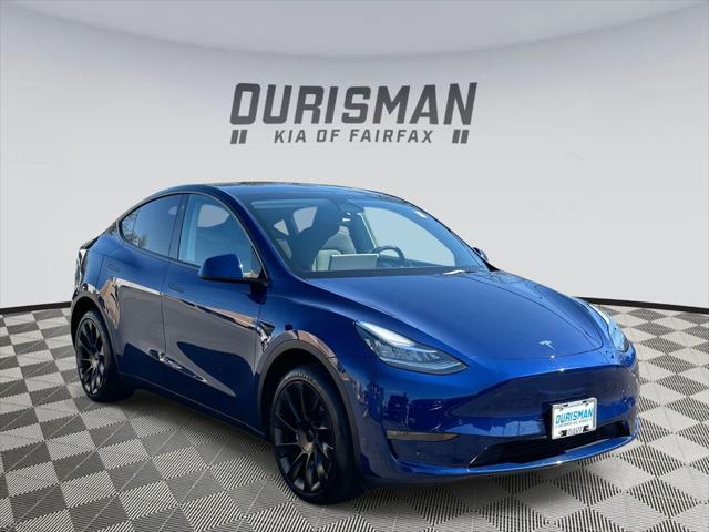 used 2023 Tesla Model Y car, priced at $31,000