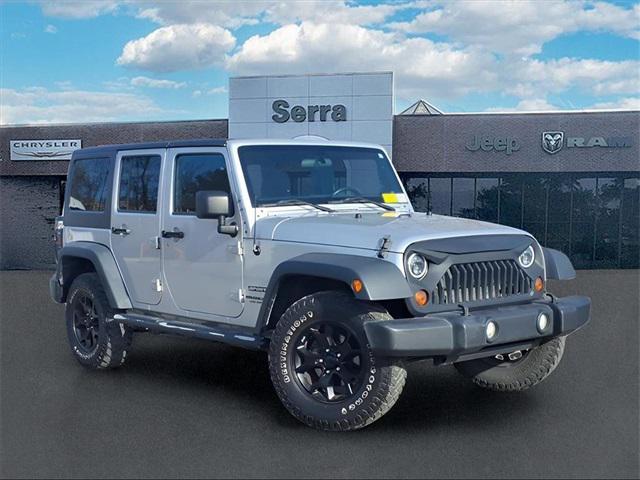 used 2012 Jeep Wrangler Unlimited car, priced at $11,000