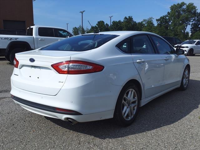 used 2016 Ford Fusion car, priced at $10,000