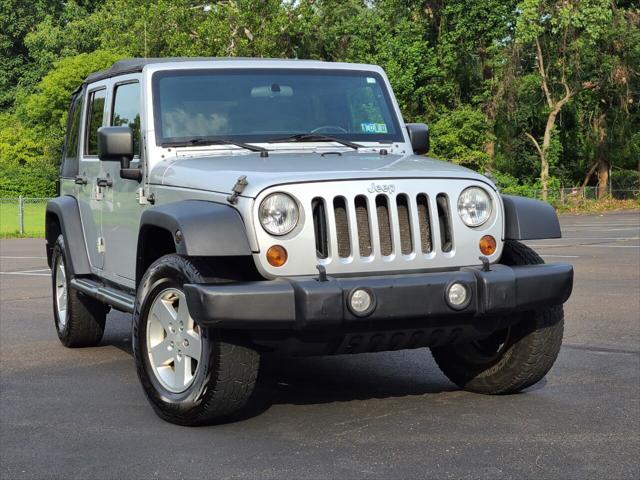 used 2011 Jeep Wrangler Unlimited car, priced at $12,555