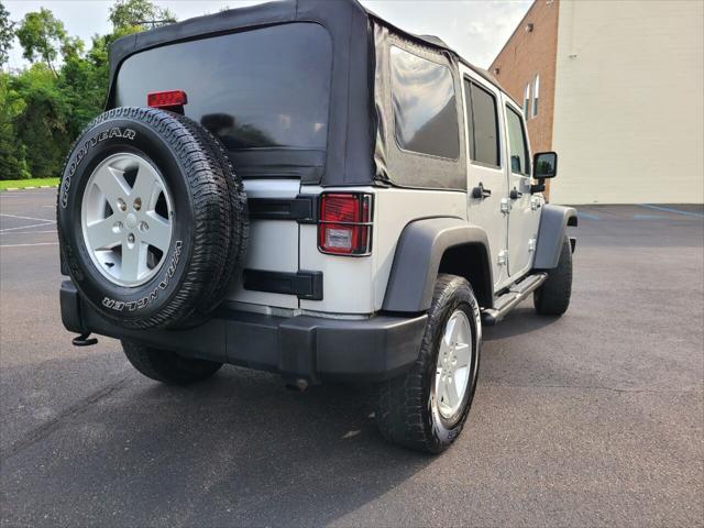 used 2011 Jeep Wrangler Unlimited car, priced at $12,555