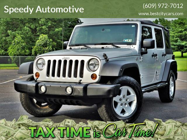 used 2011 Jeep Wrangler Unlimited car, priced at $11,911