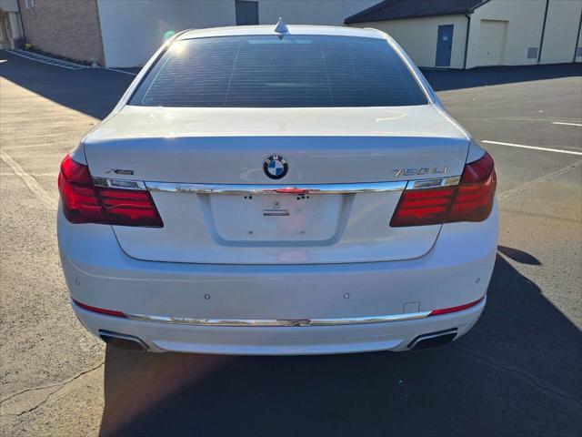 used 2013 BMW 750 car, priced at $13,555