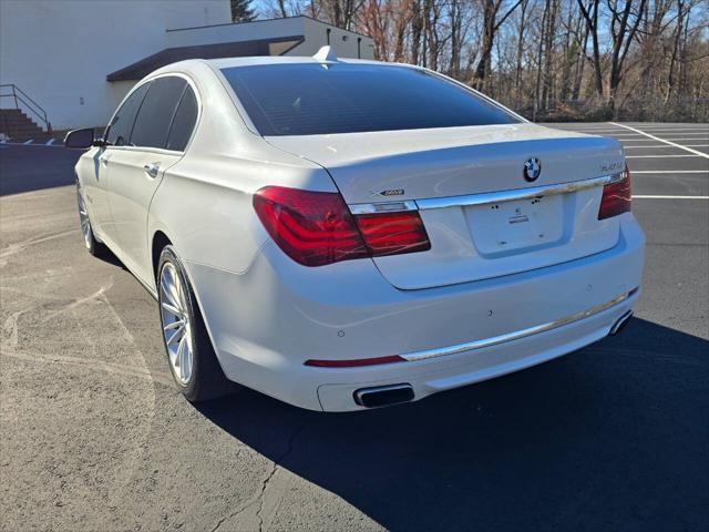 used 2013 BMW 750 car, priced at $13,555