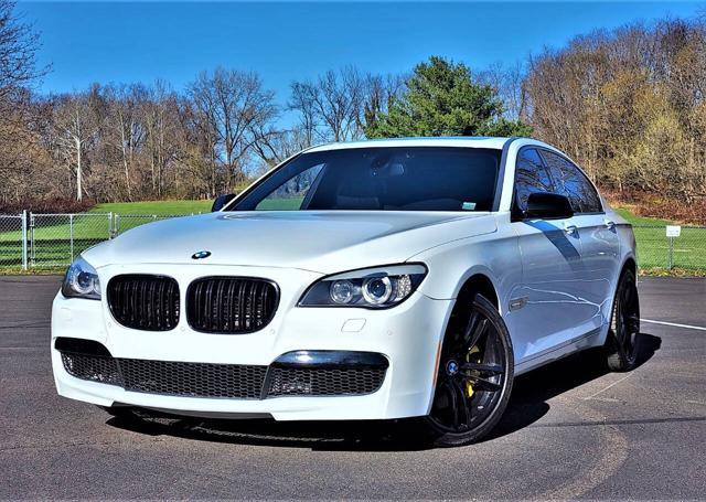 used 2013 BMW 750 car, priced at $15,000