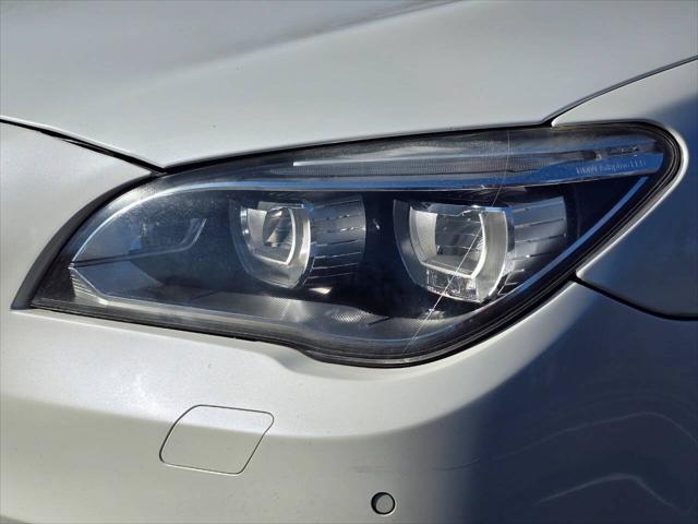 used 2013 BMW 750 car, priced at $13,555