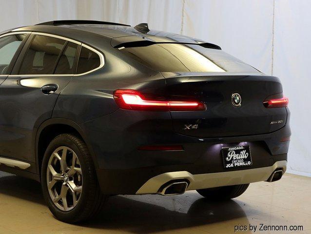 used 2025 BMW X4 car, priced at $50,988