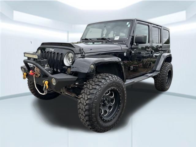 used 2016 Jeep Wrangler Unlimited car, priced at $25,899