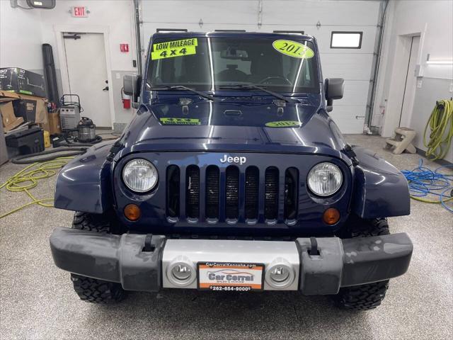 used 2013 Jeep Wrangler Unlimited car, priced at $17,595