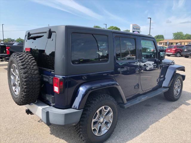 used 2013 Jeep Wrangler Unlimited car, priced at $18,500