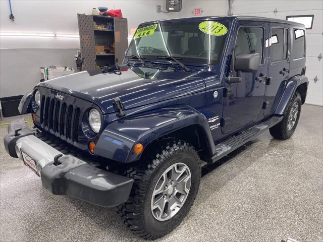 used 2013 Jeep Wrangler Unlimited car, priced at $17,595