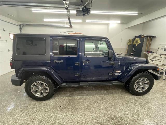 used 2013 Jeep Wrangler Unlimited car, priced at $17,595