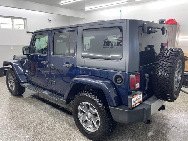 used 2013 Jeep Wrangler Unlimited car, priced at $17,595