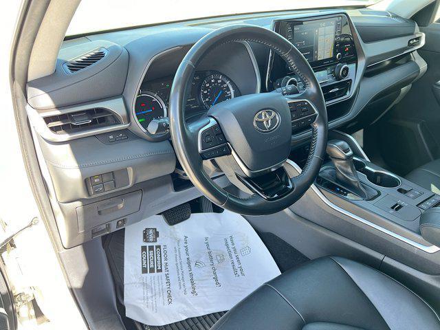 used 2021 Toyota Highlander Hybrid car, priced at $29,987
