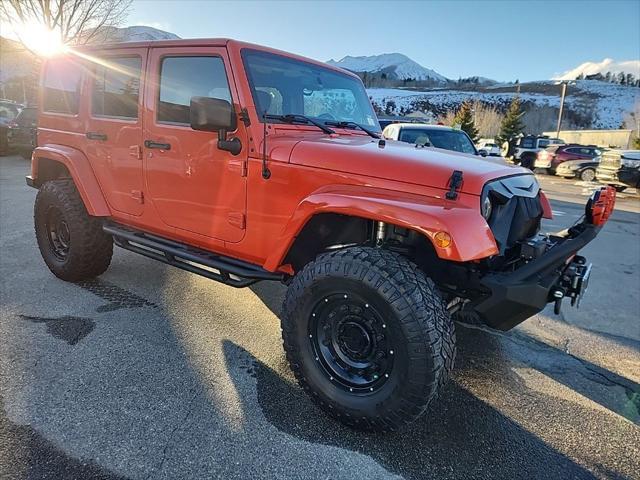 used 2015 Jeep Wrangler Unlimited car, priced at $18,949