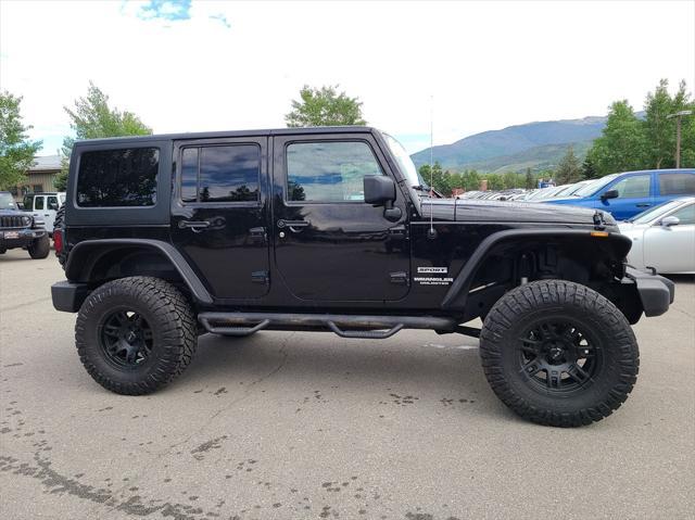 used 2015 Jeep Wrangler Unlimited car, priced at $22,191