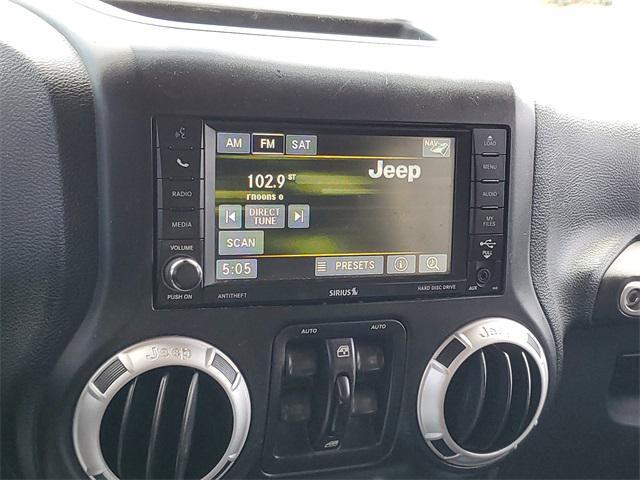 used 2014 Jeep Wrangler Unlimited car, priced at $14,378