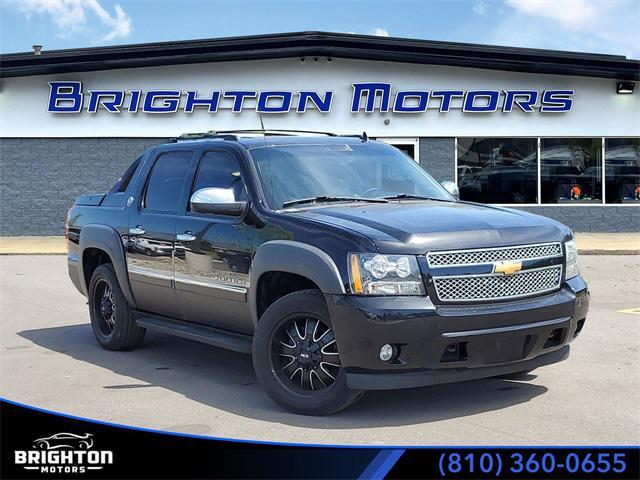 used 2013 Chevrolet Avalanche car, priced at $18,953