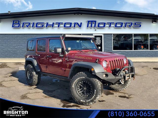 used 2013 Jeep Wrangler Unlimited car, priced at $24,825