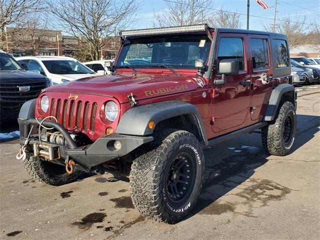 used 2013 Jeep Wrangler Unlimited car, priced at $21,385