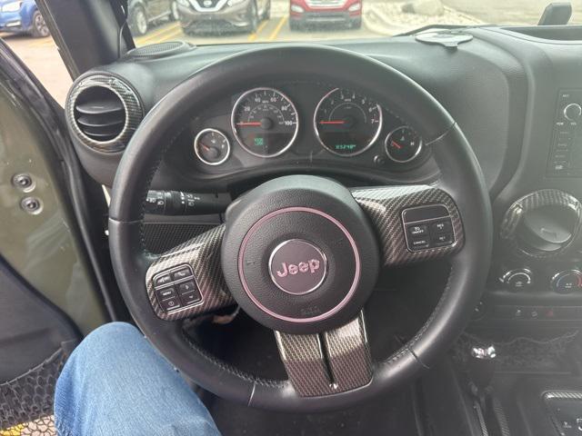 used 2015 Jeep Wrangler Unlimited car, priced at $15,862