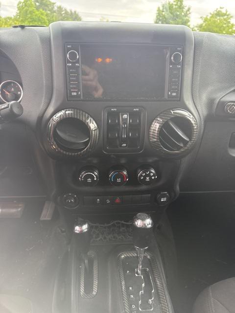 used 2015 Jeep Wrangler Unlimited car, priced at $15,862