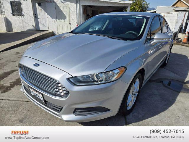 used 2014 Ford Fusion car, priced at $6,999
