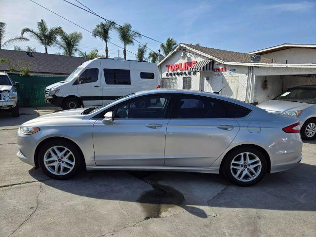 used 2014 Ford Fusion car, priced at $6,999