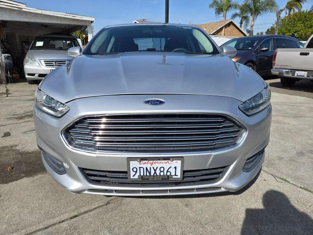 used 2014 Ford Fusion car, priced at $6,999