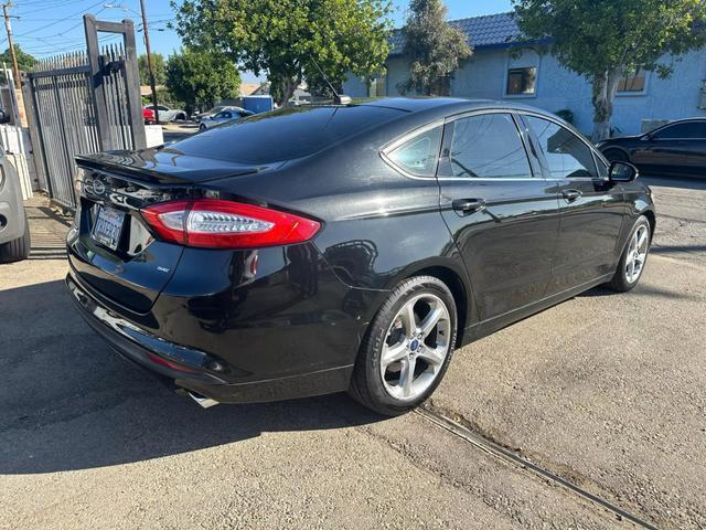 used 2013 Ford Fusion car, priced at $7,995