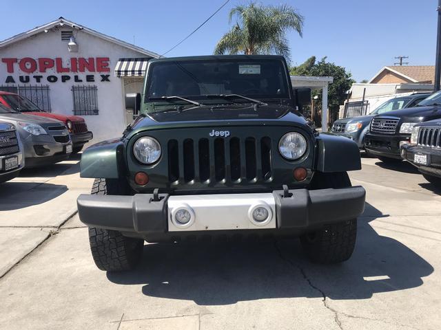 used 2011 Jeep Wrangler Unlimited car, priced at $14,999