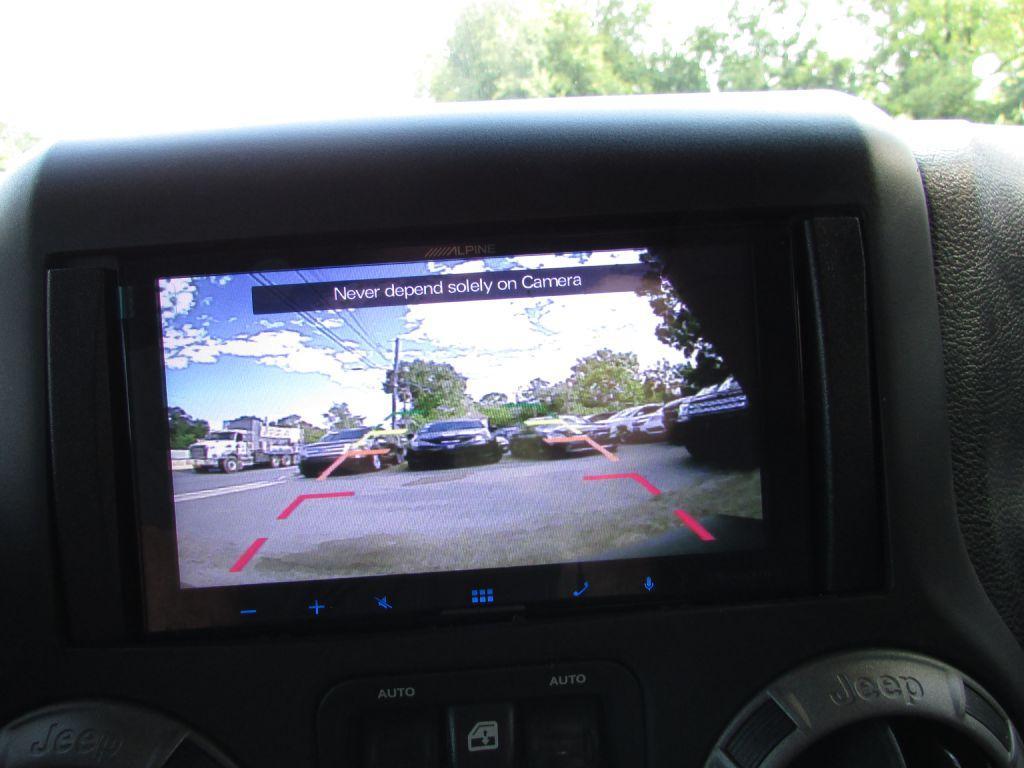 used 2015 Jeep Wrangler Unlimited car, priced at $14,995