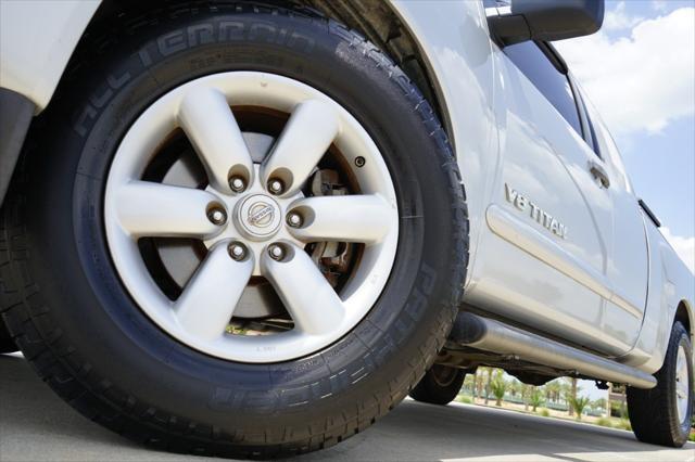 used 2013 Nissan Titan car, priced at $16,560
