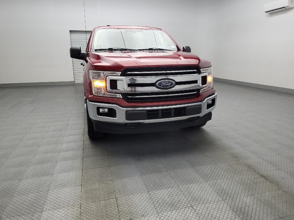 used 2018 Ford F-150 car, priced at $23,295