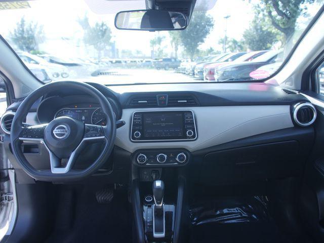 used 2021 Nissan Versa car, priced at $15,000