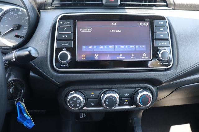 used 2024 Nissan Versa car, priced at $15,000