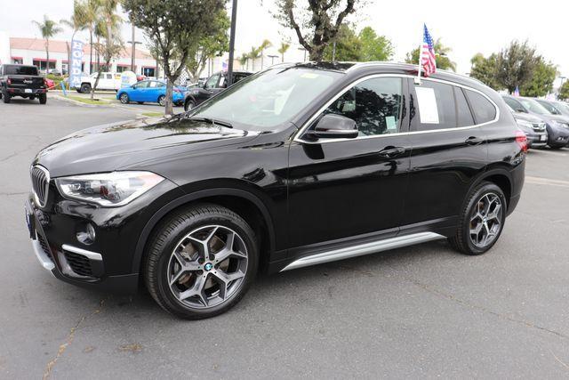 used 2018 BMW X1 car, priced at $20,000