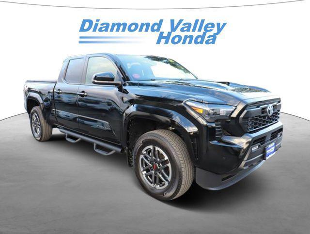 used 2024 Toyota Tacoma car, priced at $40,000