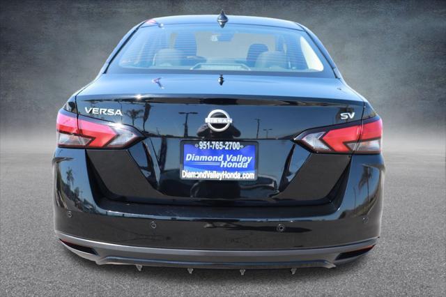 used 2023 Nissan Versa car, priced at $15,000