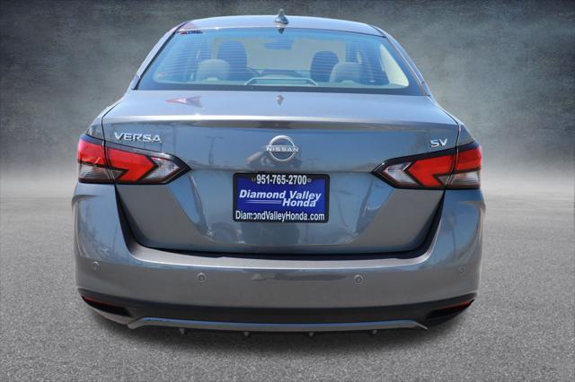 used 2023 Nissan Versa car, priced at $14,000