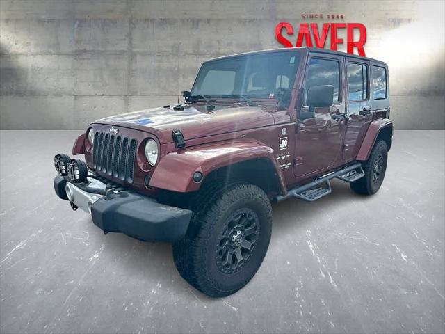 used 2010 Jeep Wrangler Unlimited car, priced at $12,895