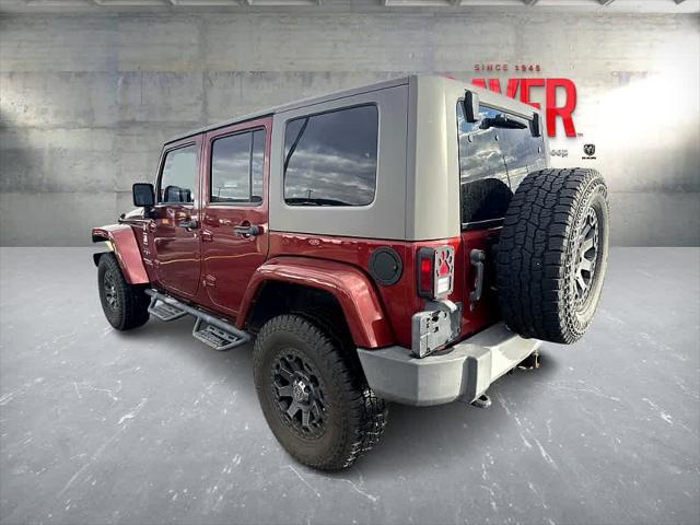 used 2010 Jeep Wrangler Unlimited car, priced at $12,895