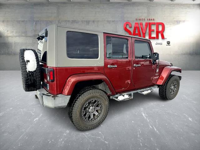 used 2010 Jeep Wrangler Unlimited car, priced at $12,895