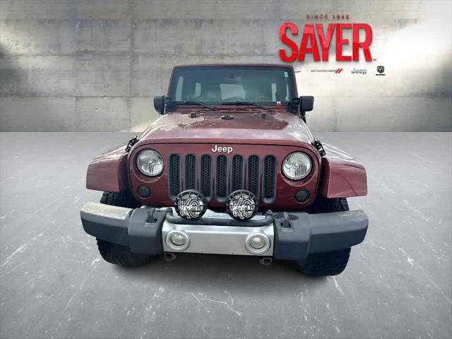 used 2010 Jeep Wrangler Unlimited car, priced at $12,895