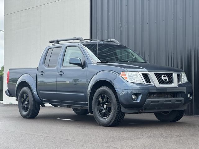 used 2013 Nissan Frontier car, priced at $18,979