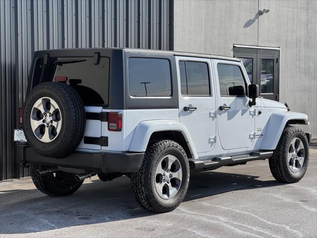 used 2018 Jeep Wrangler JK Unlimited car, priced at $23,979