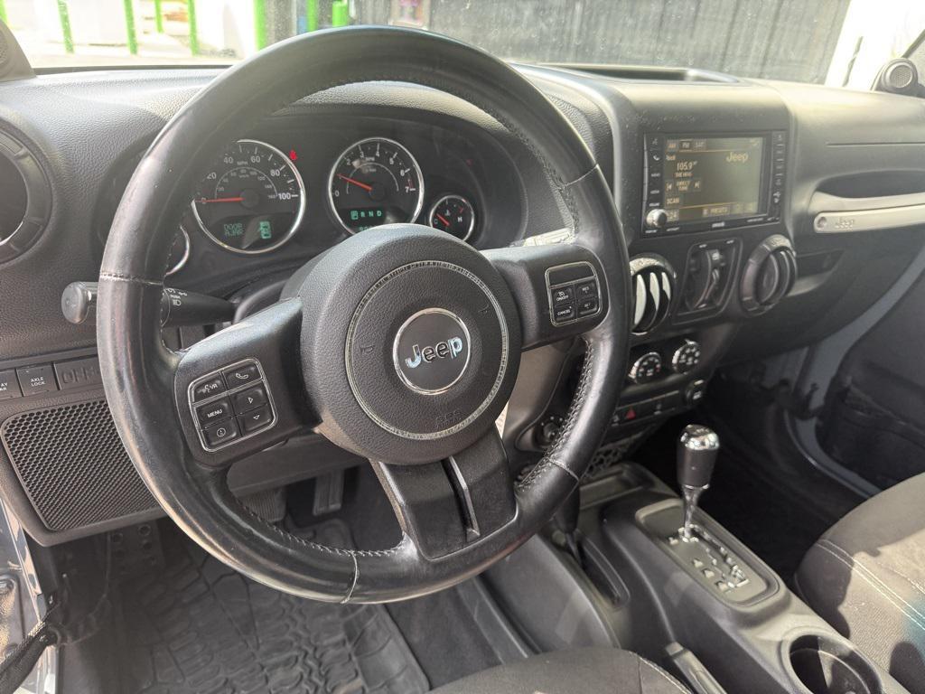 used 2014 Jeep Wrangler Unlimited car, priced at $20,979